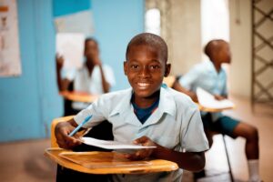 Student smiling in classroom